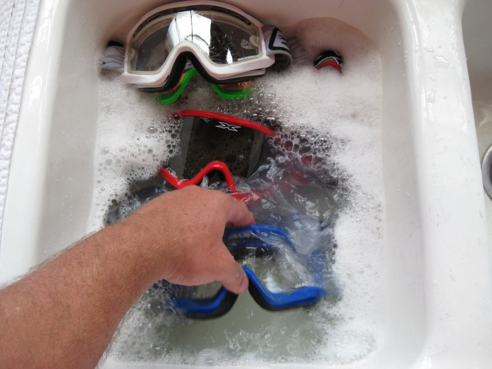 Washing motocross goggles